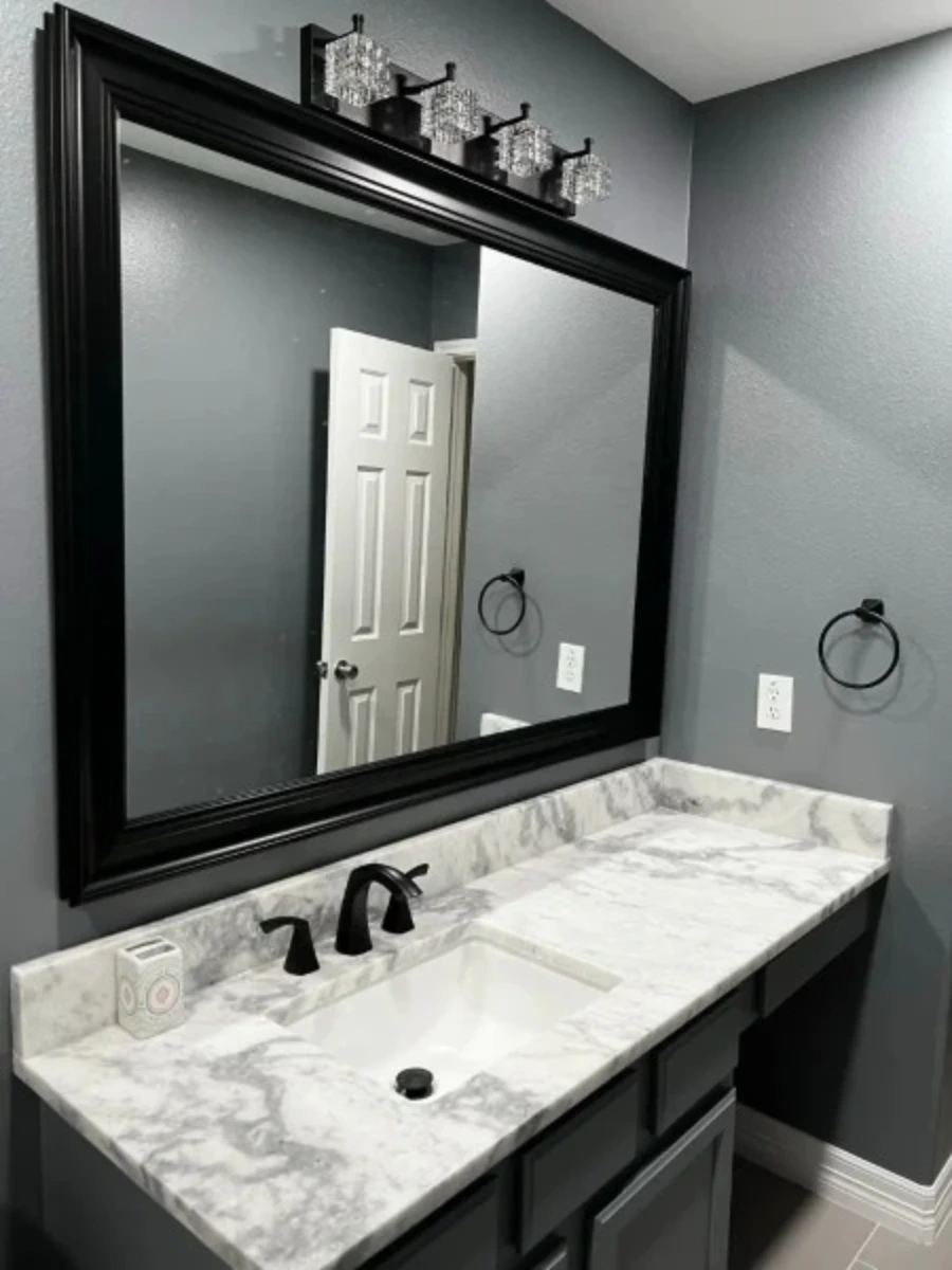 Marble Vanity with Round Mirror — bathroom remodeling Conroe TX